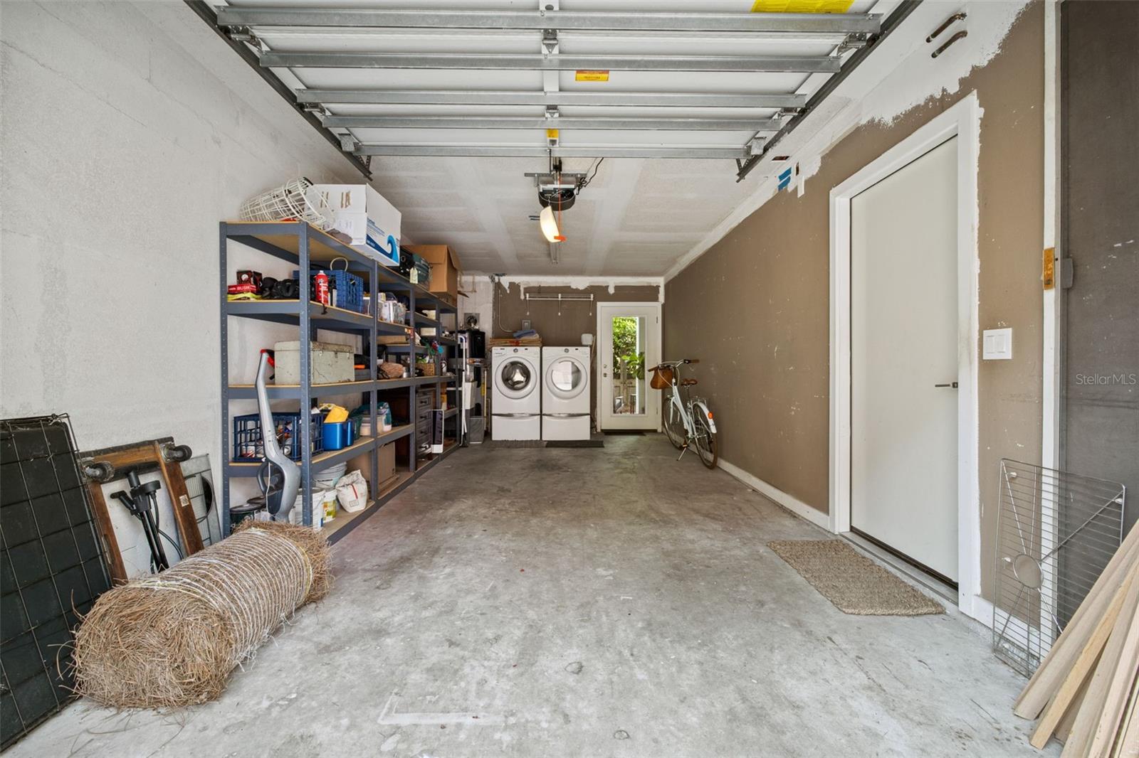 One car garage with washer/dryer.  Plus door to the back private courtyard.