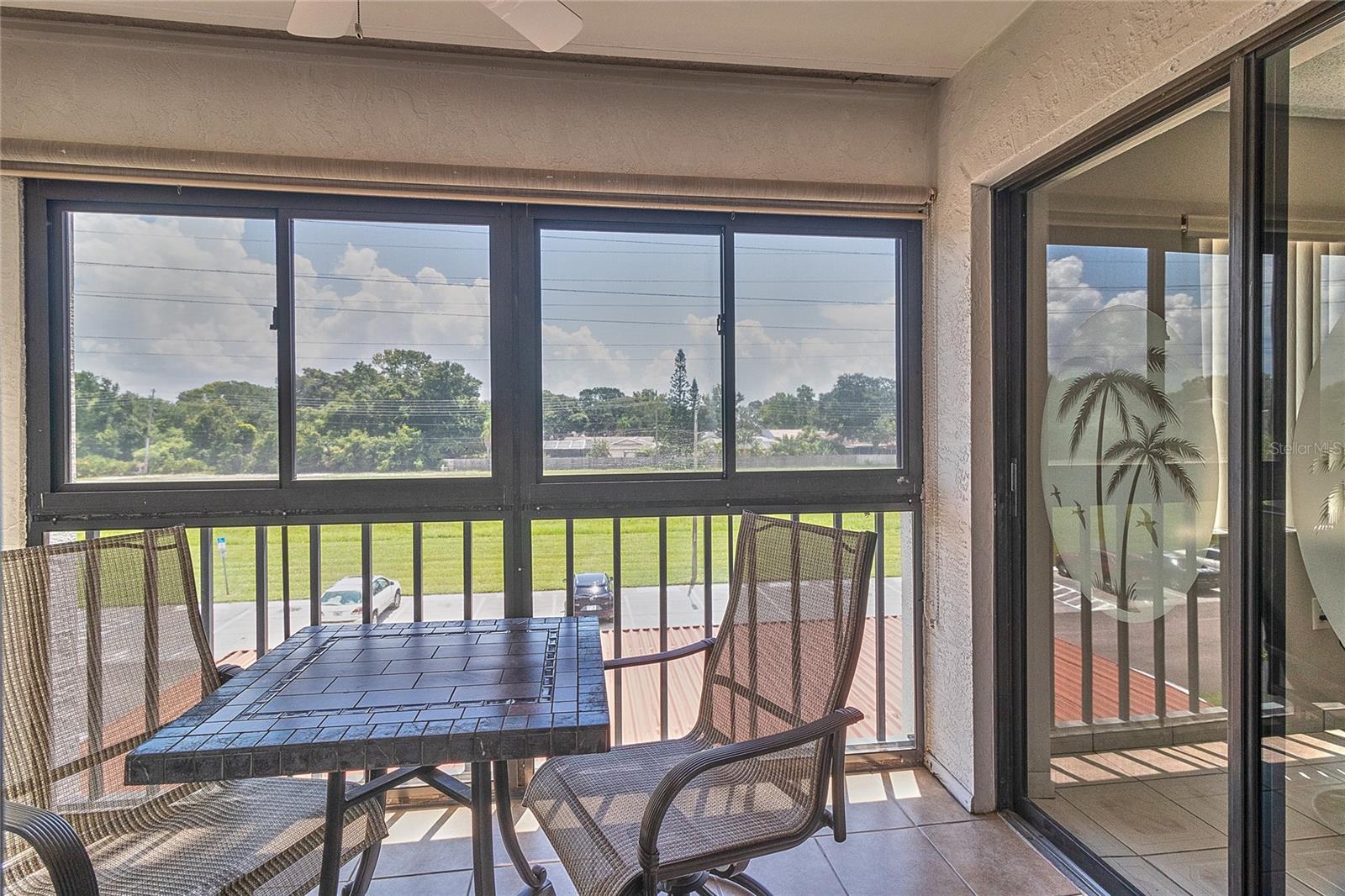 Enclosed Sun Porch off Living Room and Second Bedroom