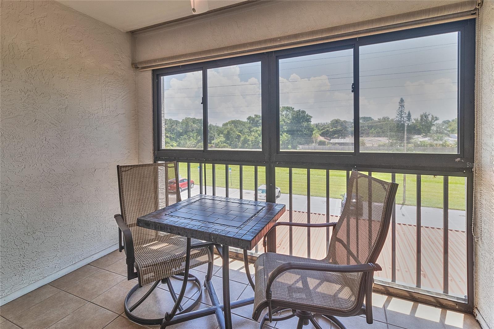 Enclosed Sun Porch off Living Room and Second Bedroom