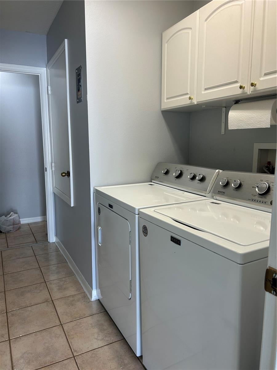 Laundry with storage and Garage entrance