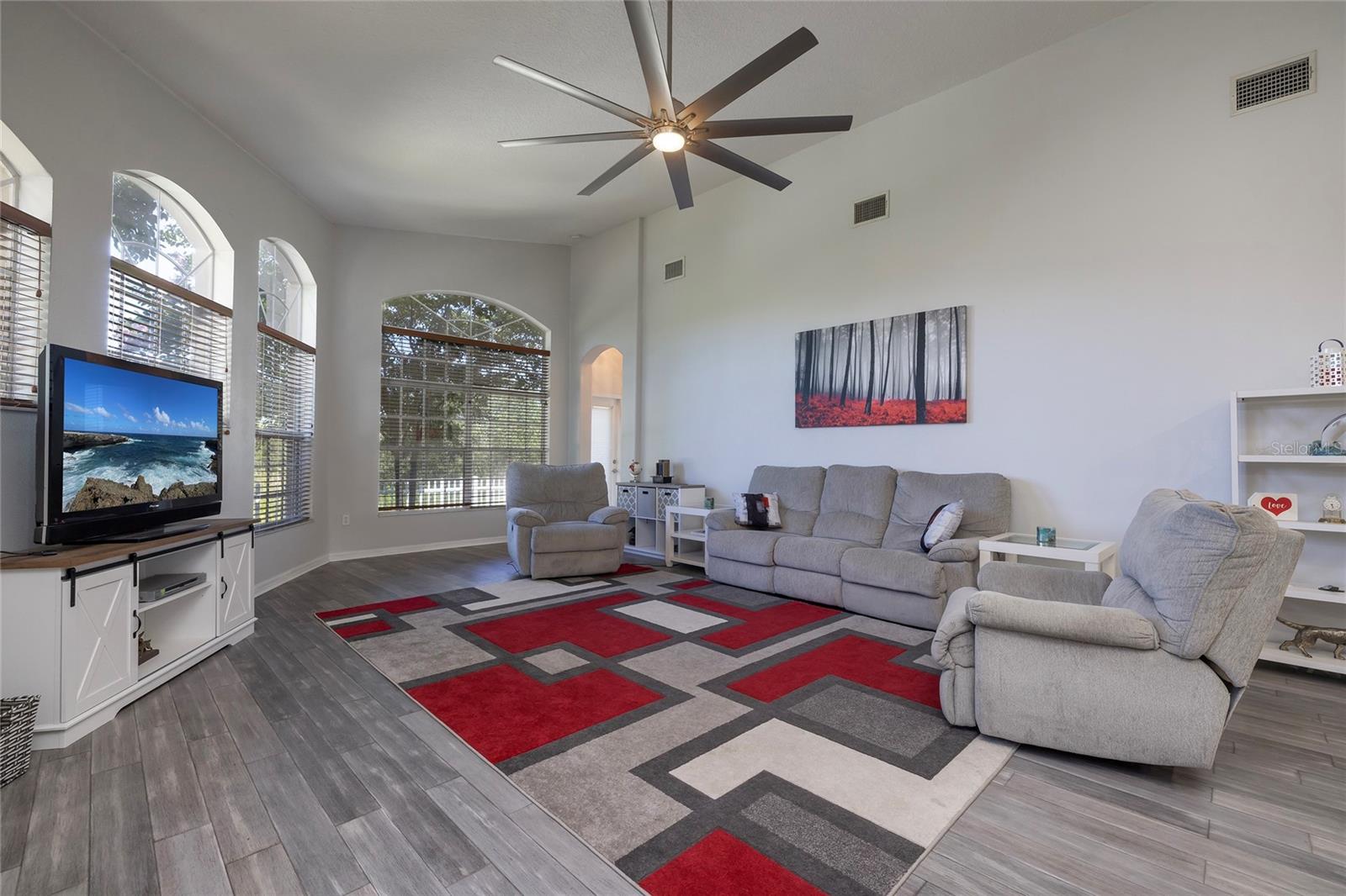 Large Family room with sliders to the patio