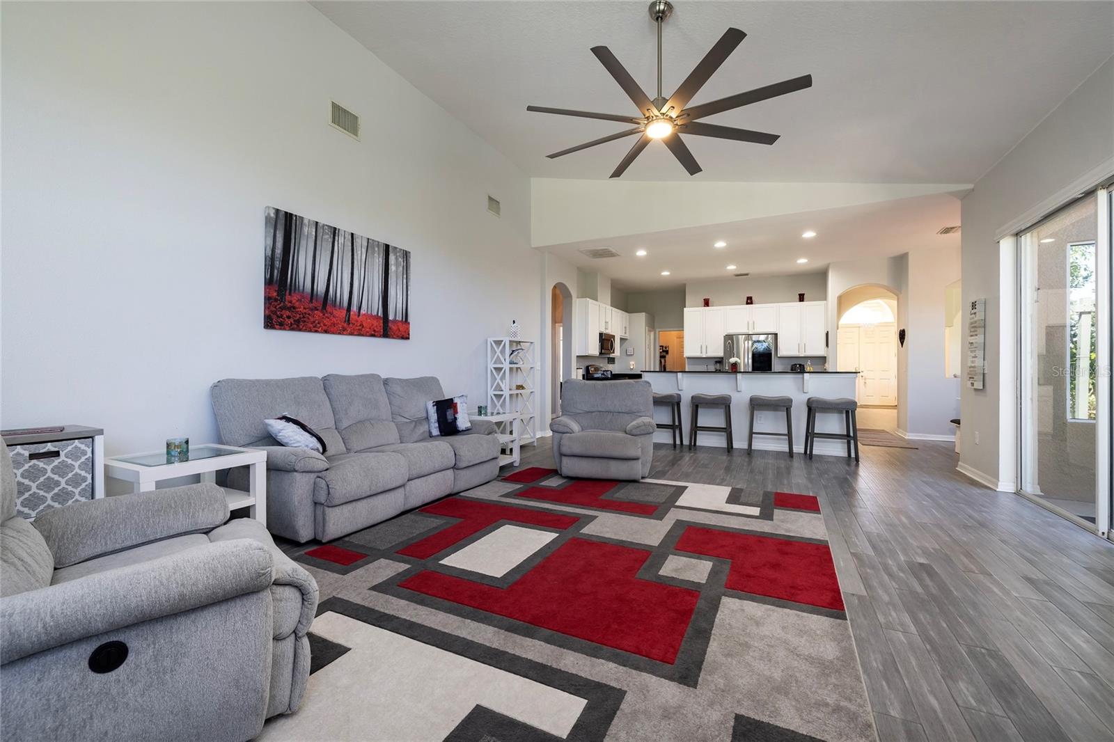 Large Family room with sliders to the patio