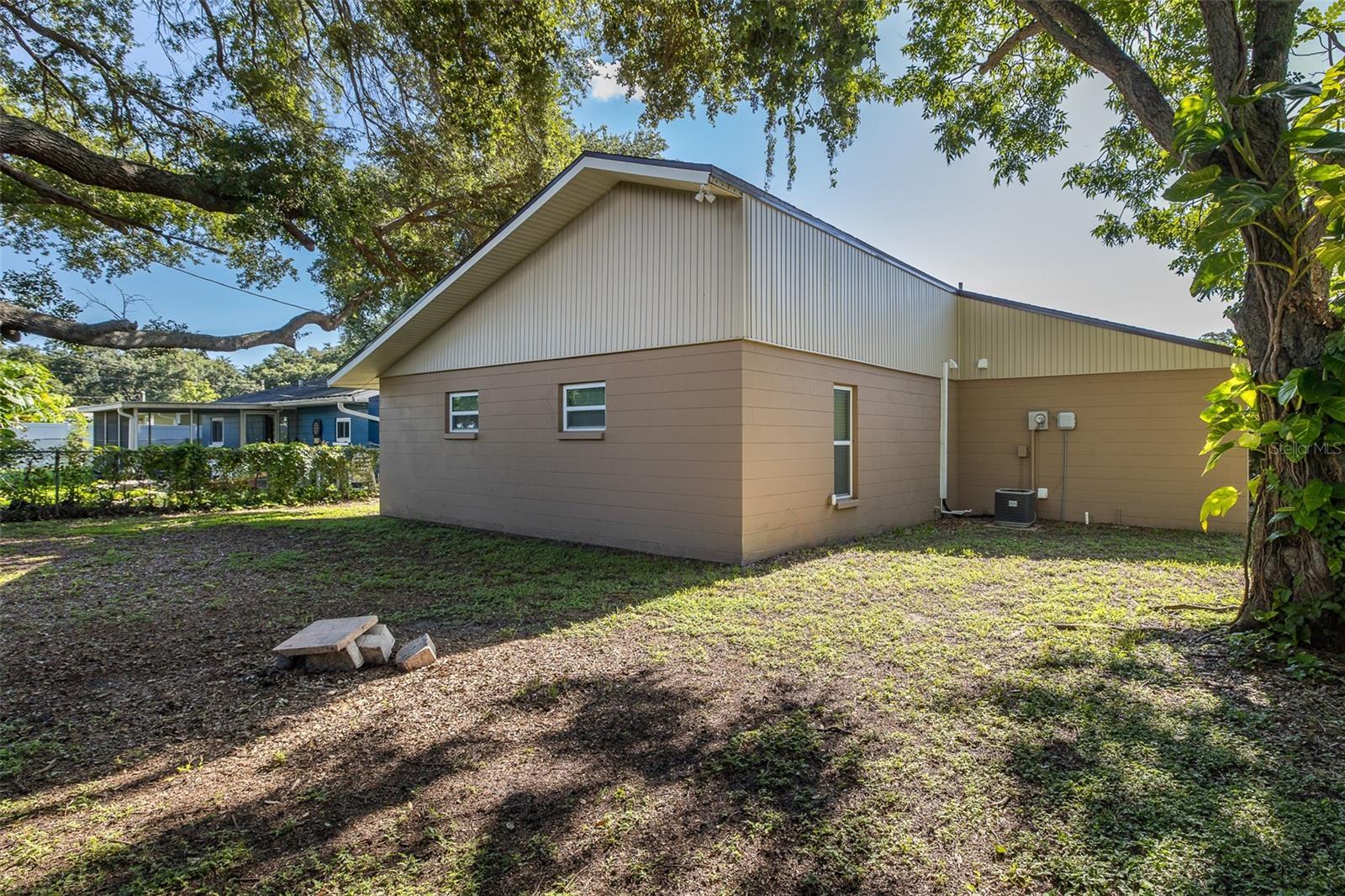 Large, shaded backyard