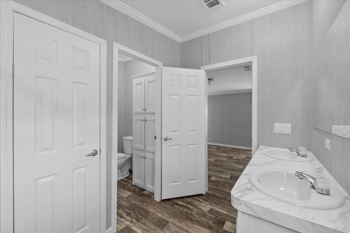 Primary Bathroom w/ Private Water Closet & Linen Closet