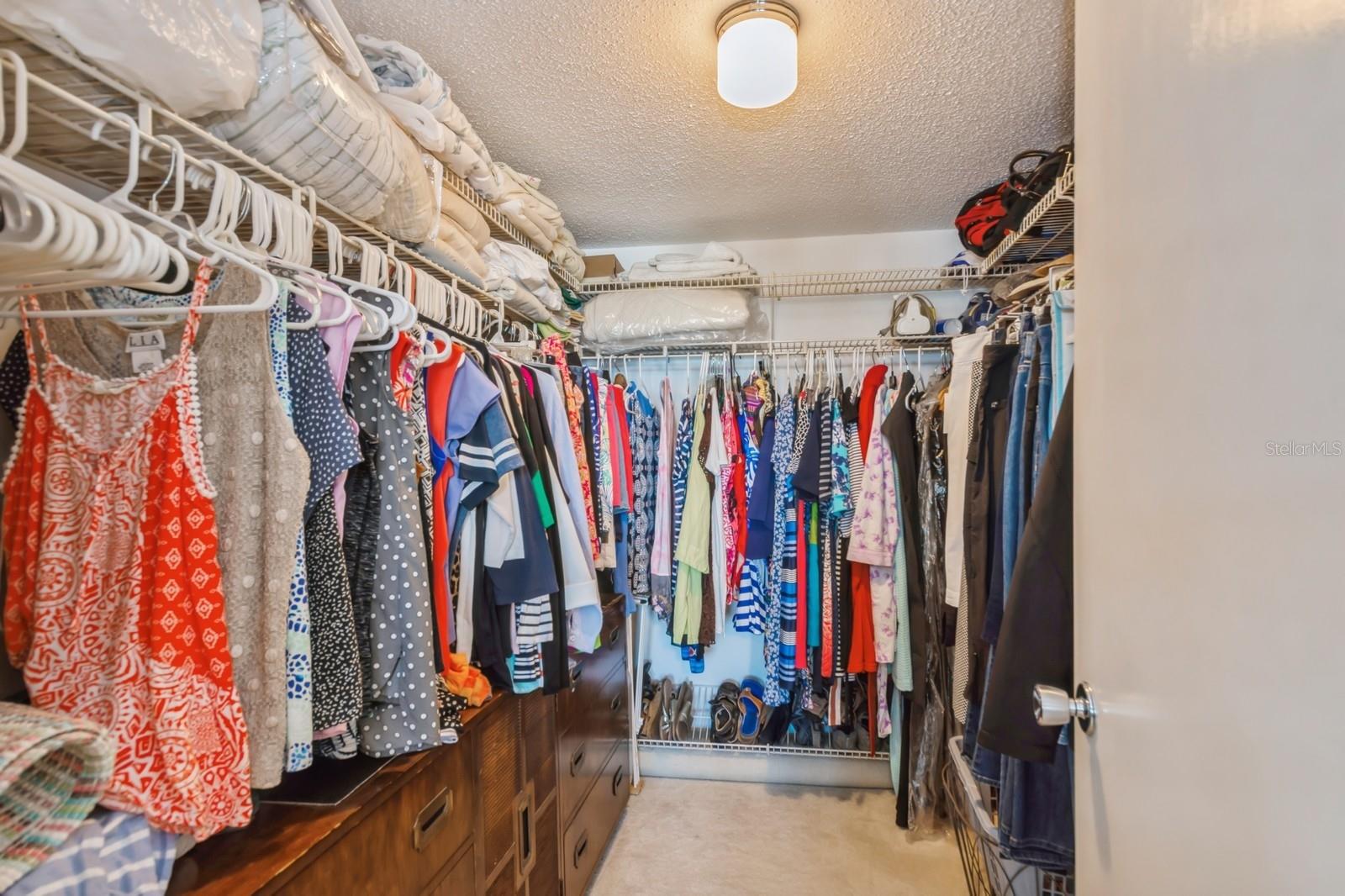 Large primary bedroom walk-in closet