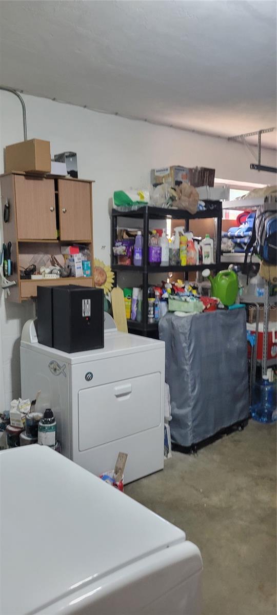 Washer and dryer in garage.