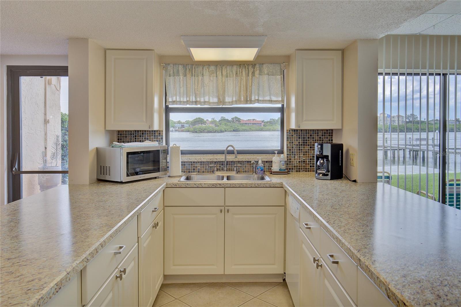 Clubhouse kitchen has waterviews.