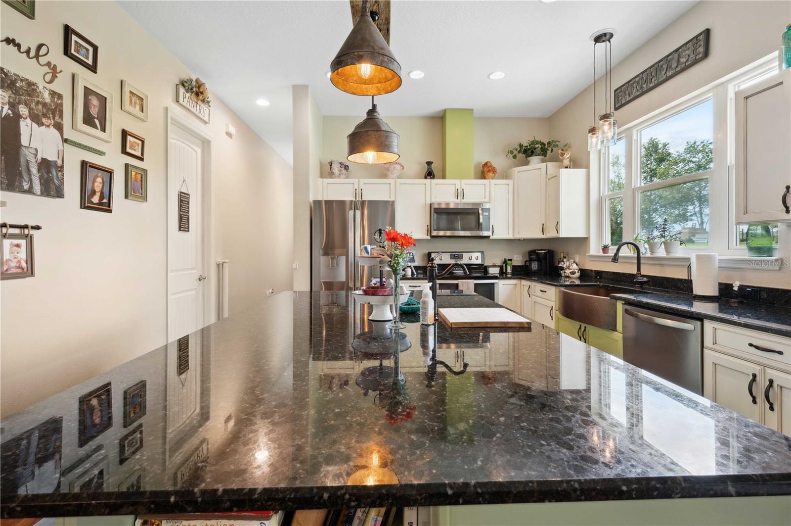 Chef's Kitchen with stainless appliances, granite, a large island and MUCH more!