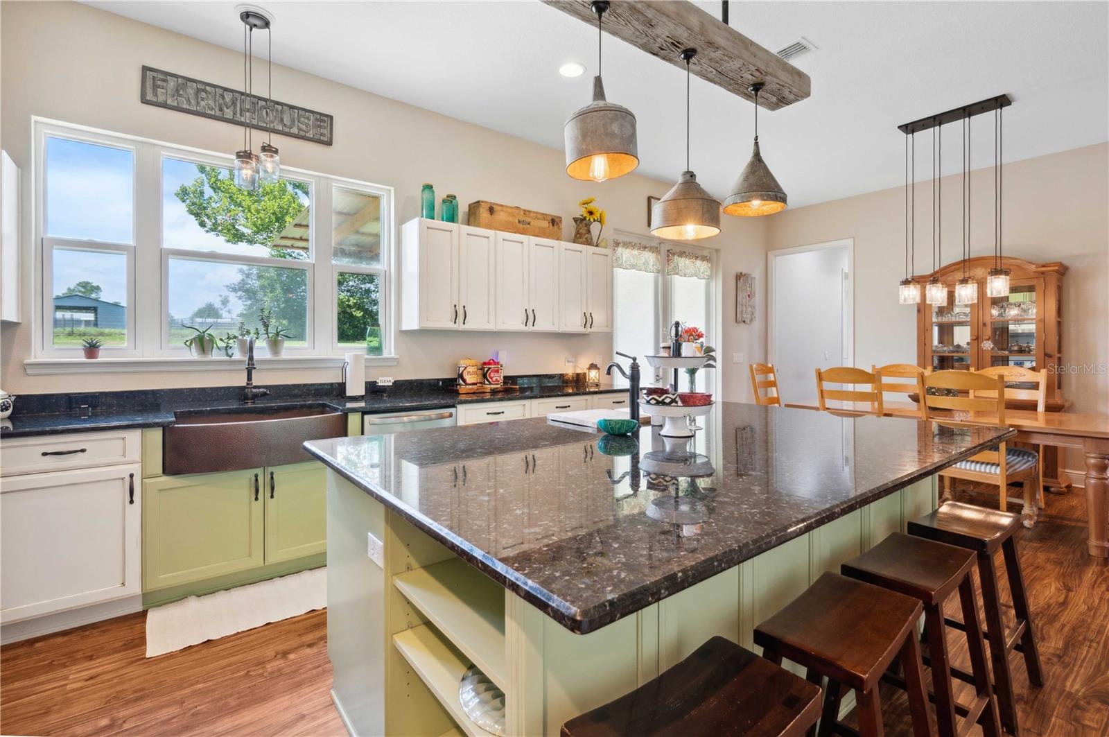 Chef's Kitchen with stainless appliances, granite, a large island and MUCH more!