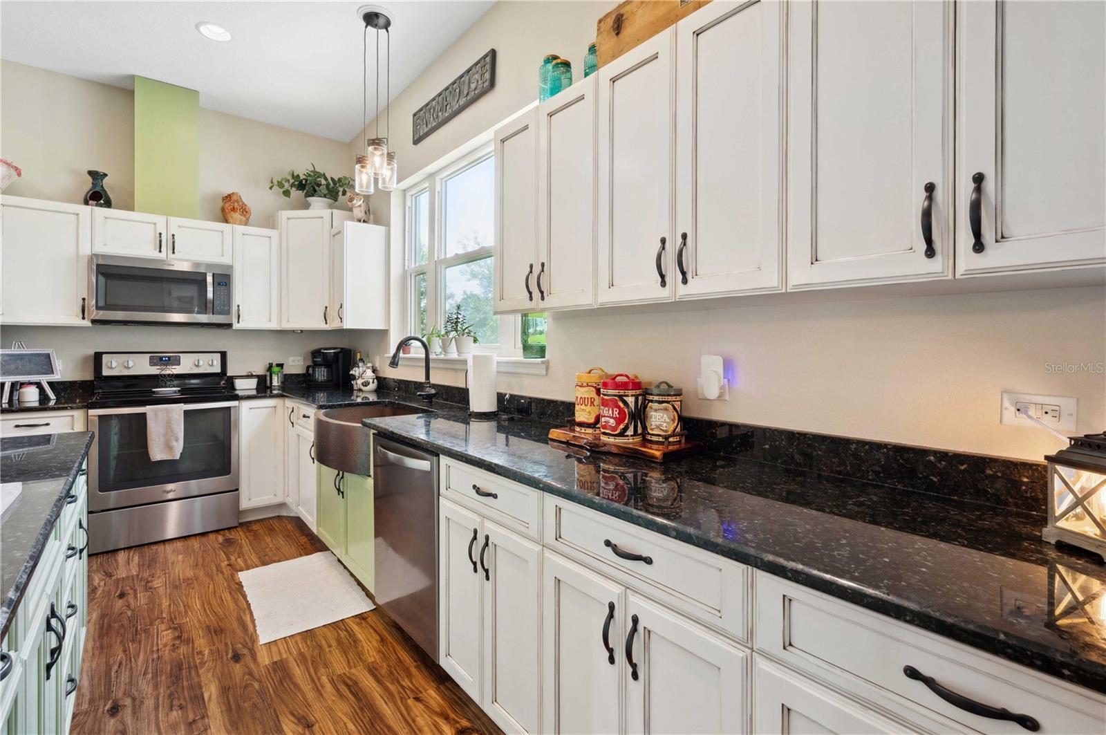 Chef's Kitchen with stainless appliances, granite, a large island and MUCH more!