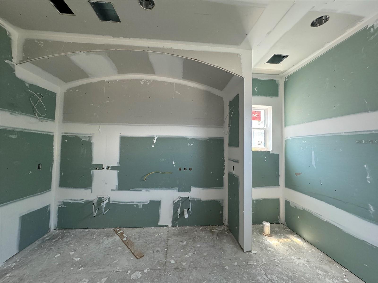 primary bathroom with dual vanities