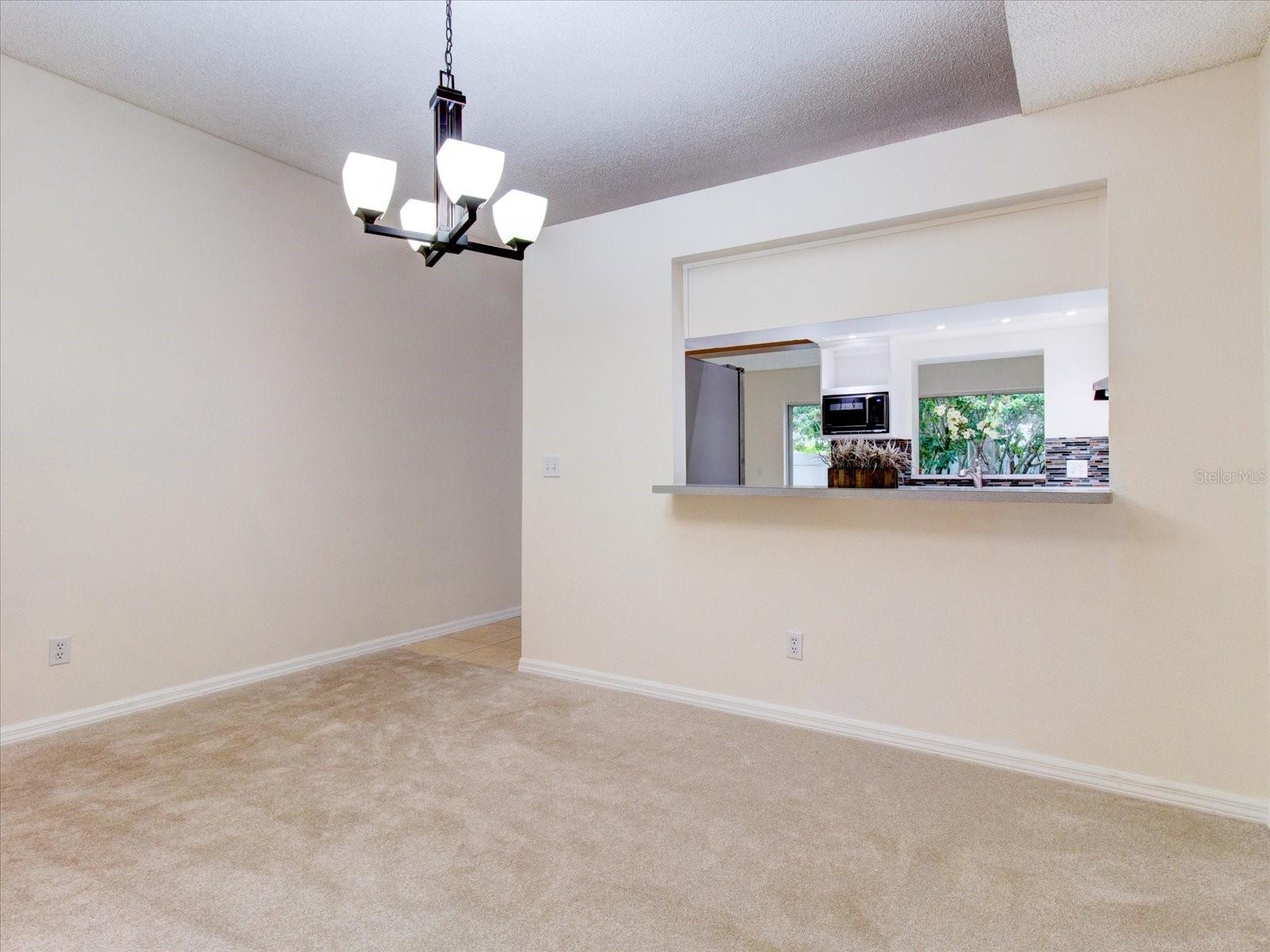 First Floor: In The Dining Room With The View Of The Kitchen Bar