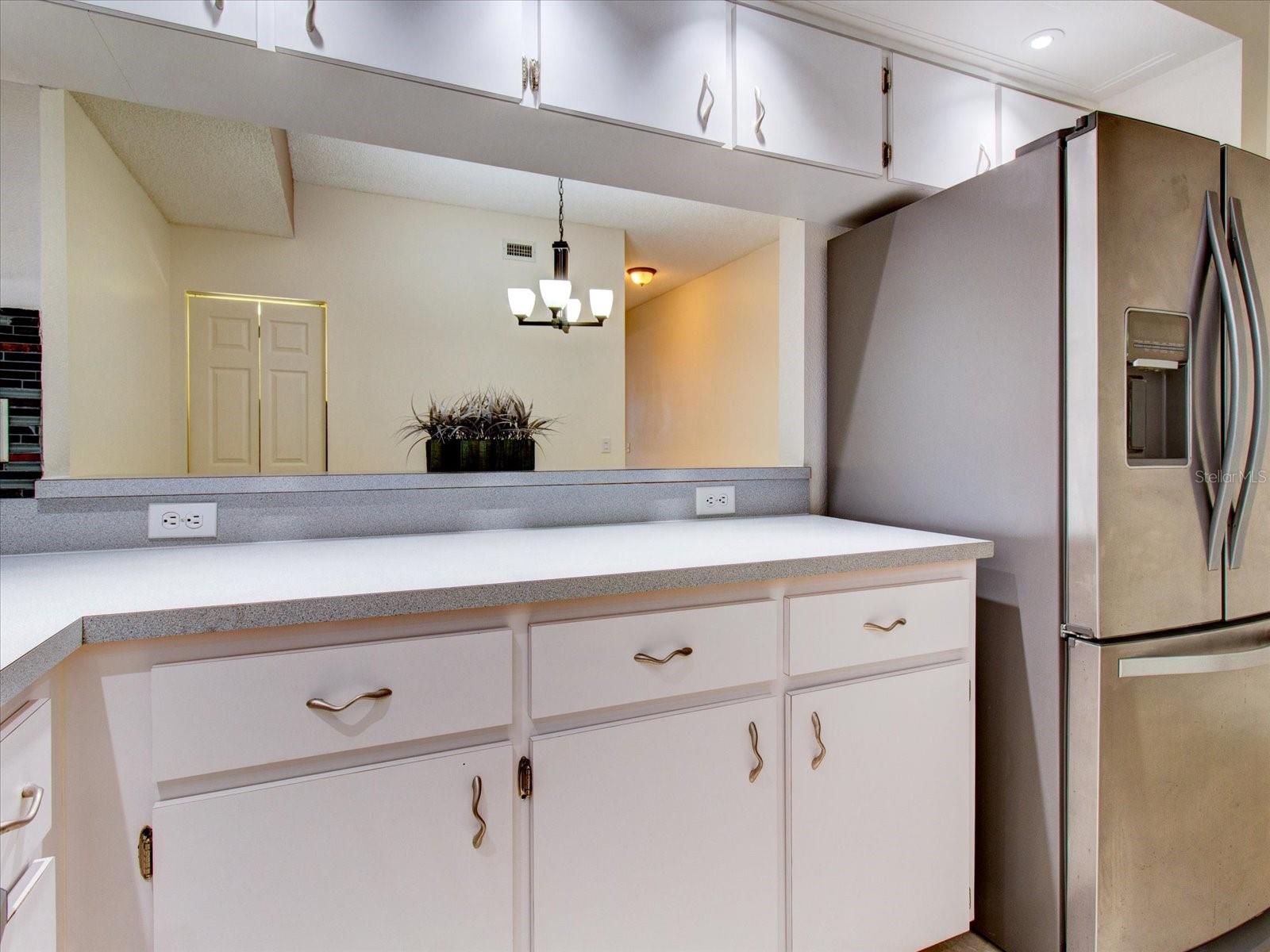 A side view of the kitchen facing towards the dining room