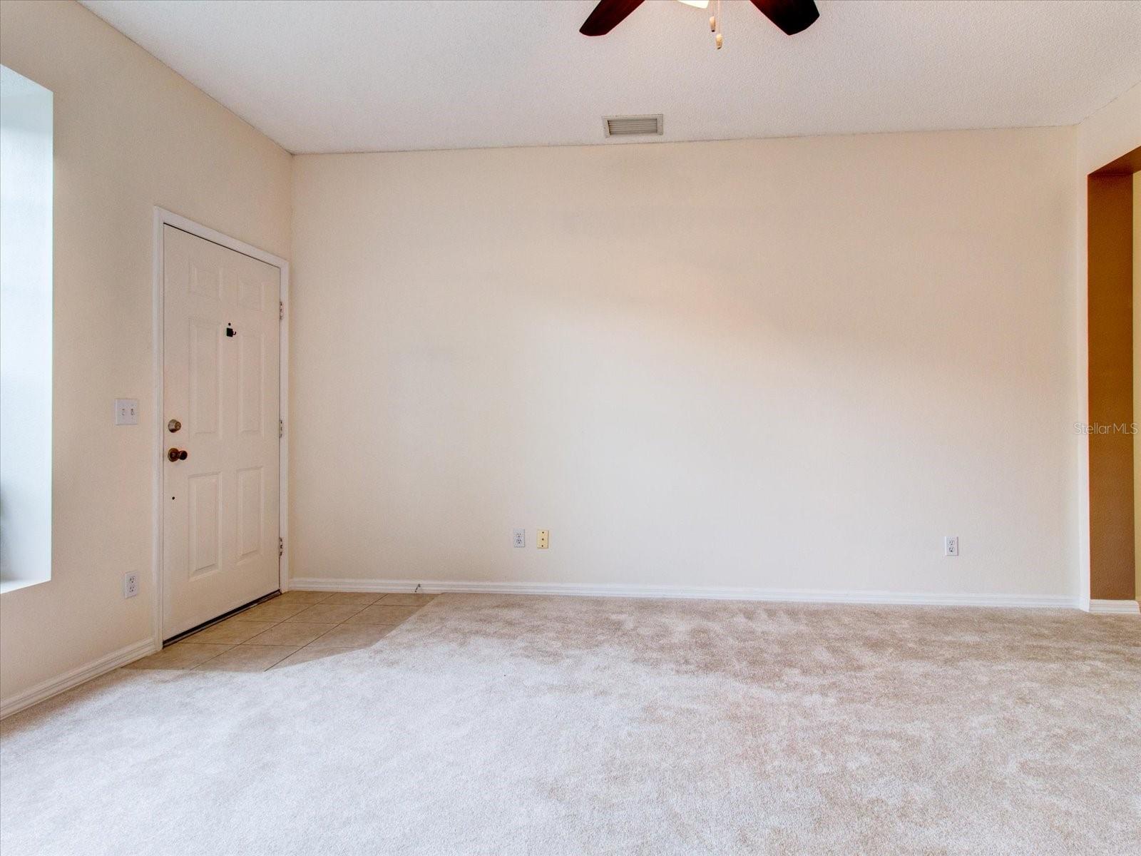 First Floor: The View Of The Living Room And The Front Entrance Door