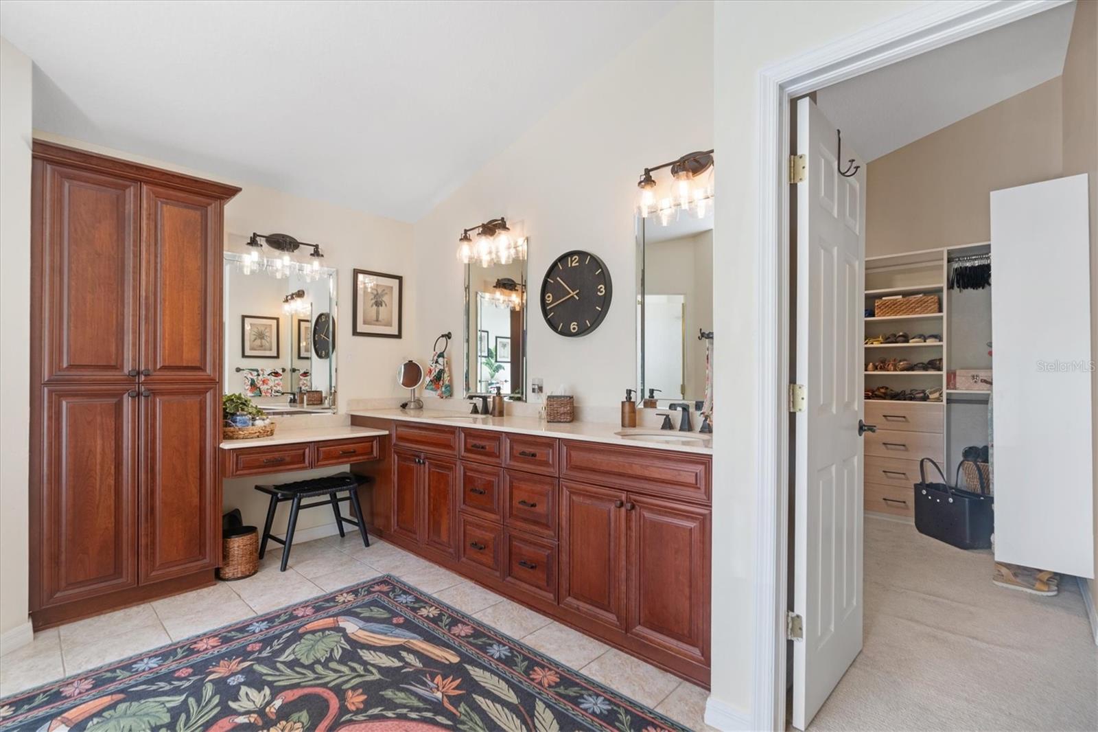 Rich Granite Counters and Elegant Maple Cabinetry