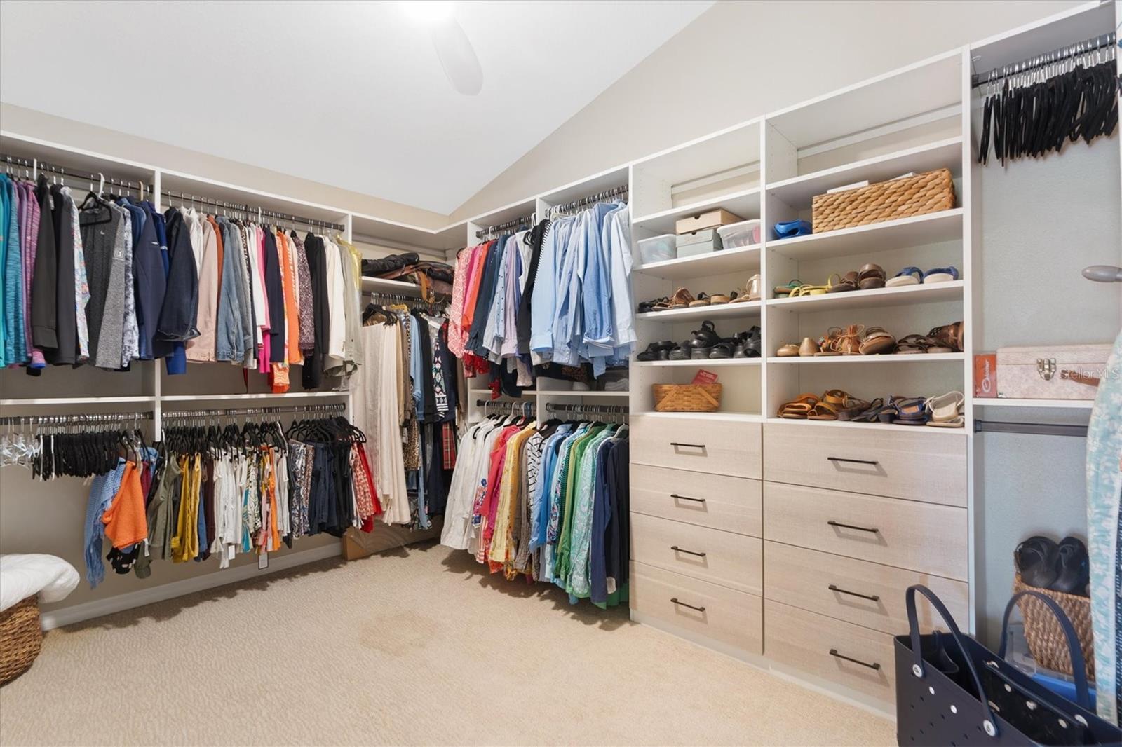 Primary Walk-In Closet with with Custom California Closet System