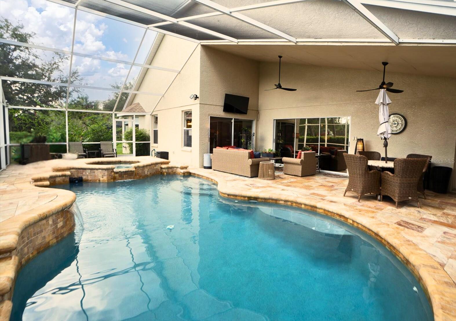 Travertine Deck Surrounds Pool