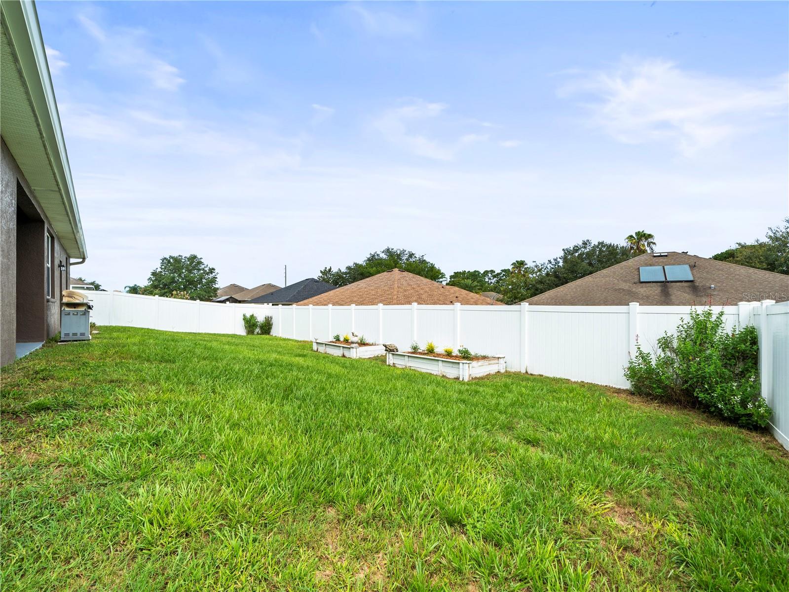 Fenced back yard offers privacy for you to enjoy Florida living.  Plenty of room for a pool too!