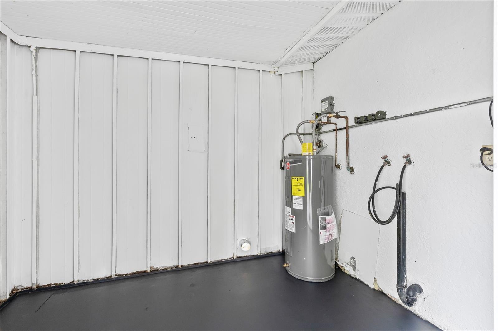 Storage/ Laundry Shed off Carport