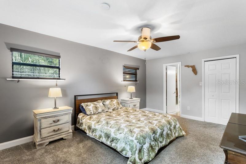 STEP INTO THE EPITOME OF COMFORT & CONVENIENCE IN THIS PRIMARY BEDROOM. THE ROOM OPENS UP WITH AN INVITING AURA, ADORNED IN SOOTHING COLORS THAT CREATE AN IMMEDIATE SENSE OF RELAXATION.