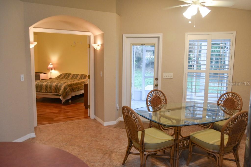 view of primary bedroom from kitchen