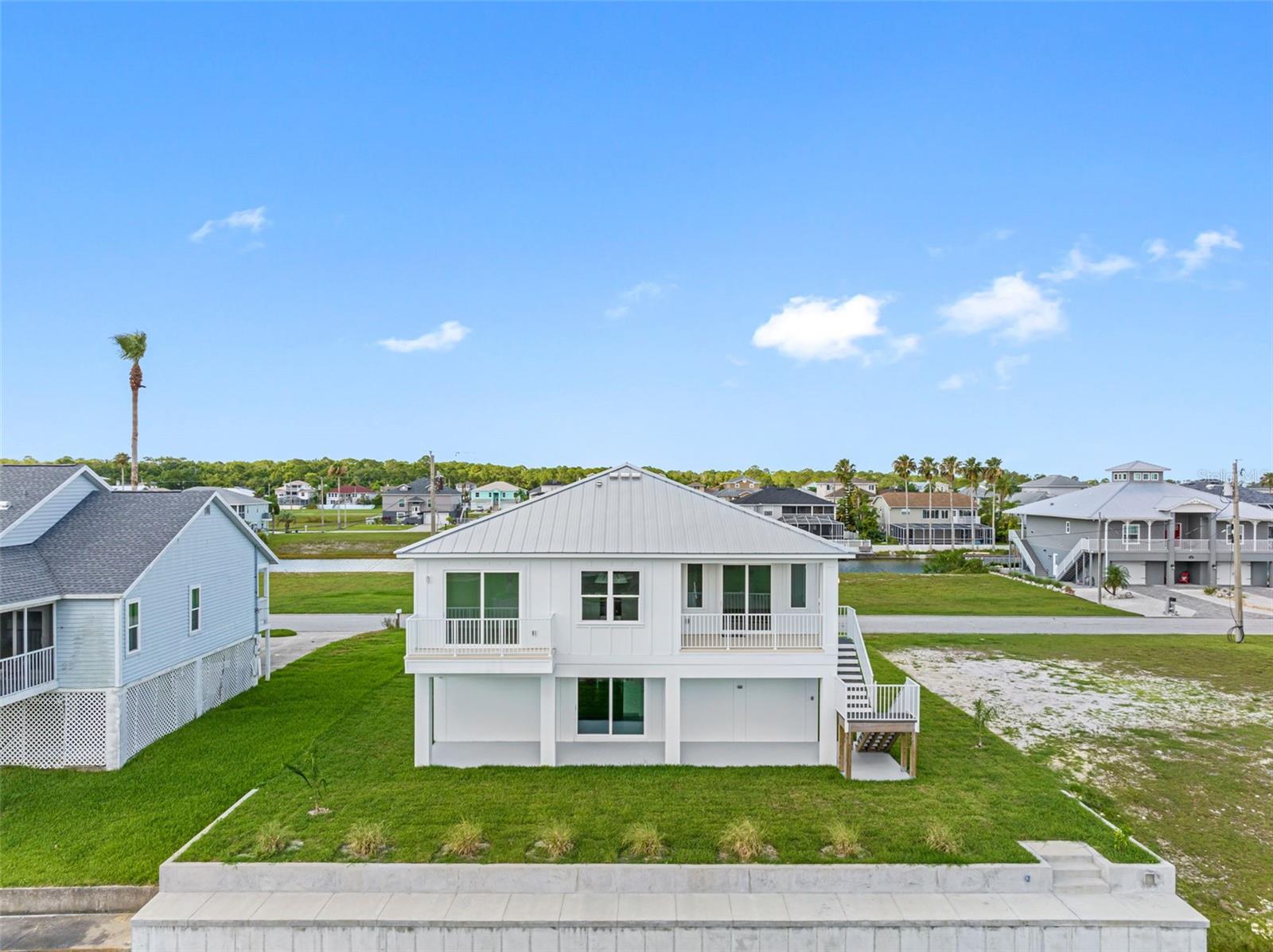 Aerial View Rear of Home & Seawall