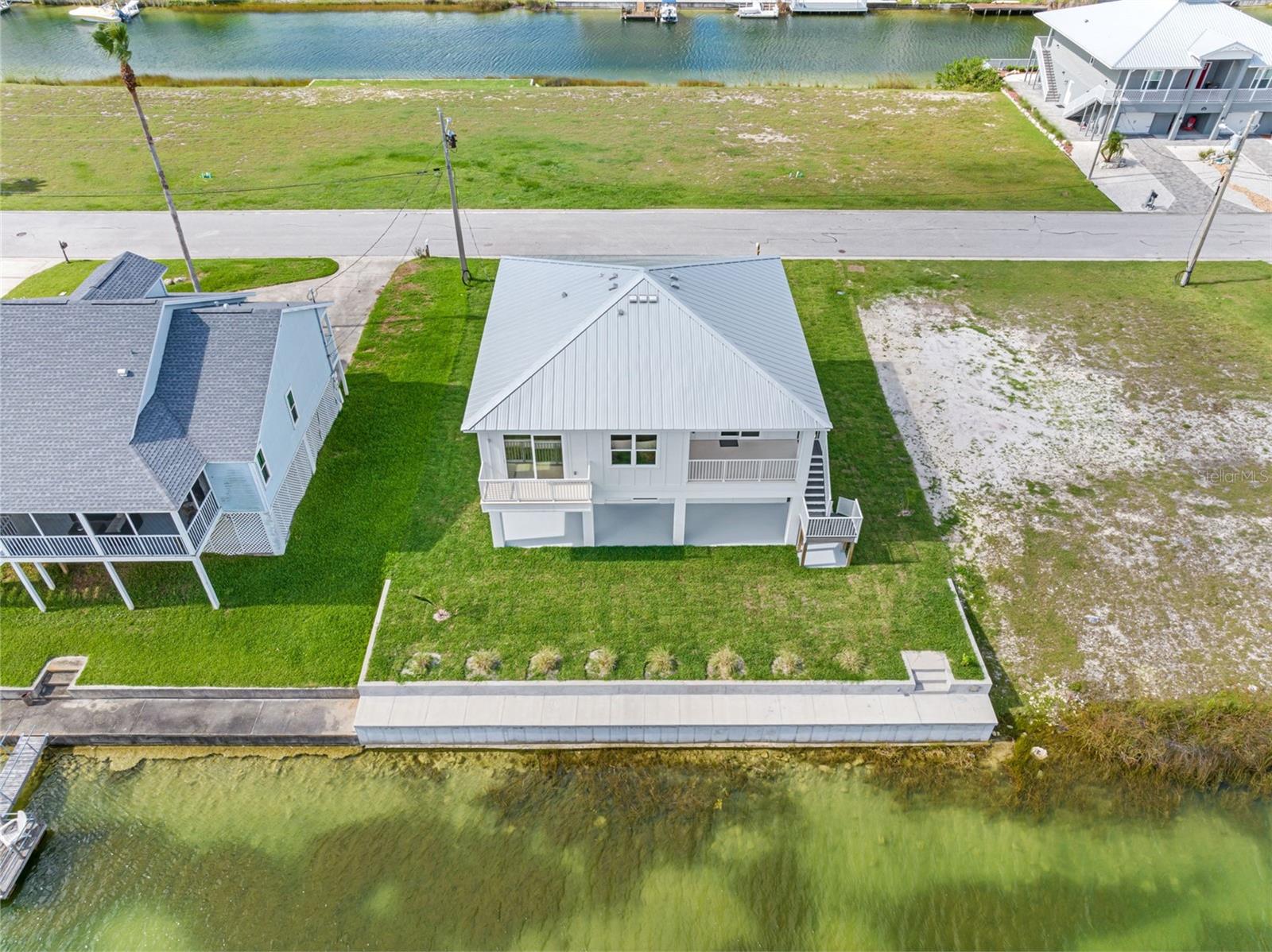 Aerial View Home and Seawall