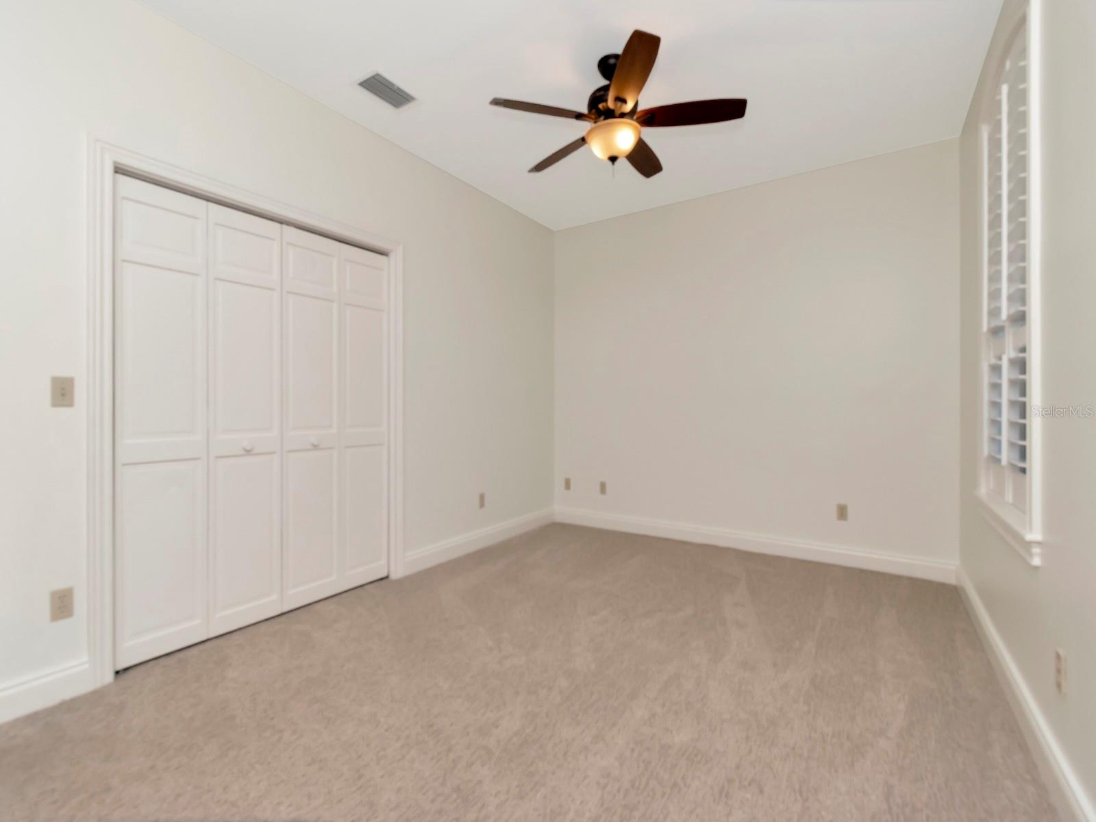 Generous fourth bedroom features Walk Out Balcony to sit among the birds.