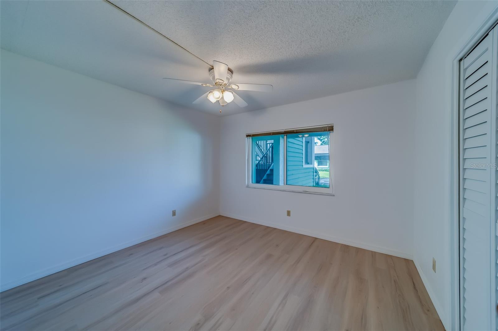 Guest Bedroom with updated hurricane windows