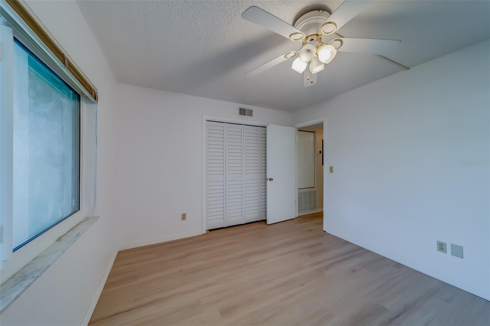 Guest Bedroom with updated hurricane windows