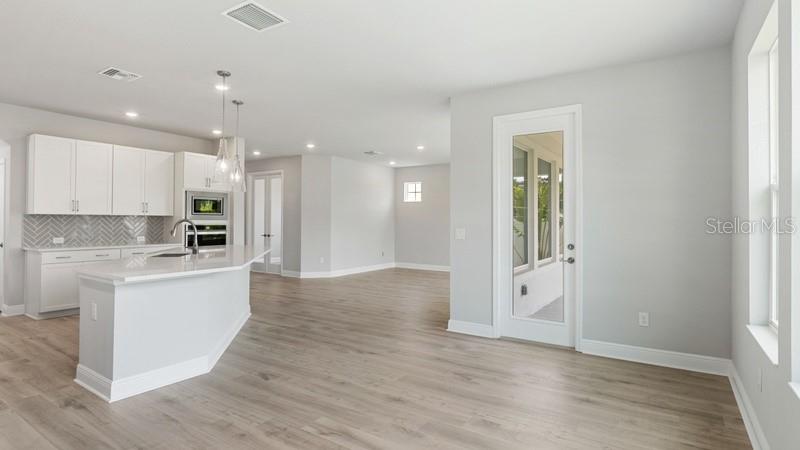 Dining Room & Kitchen **Photos are of a Similar Home