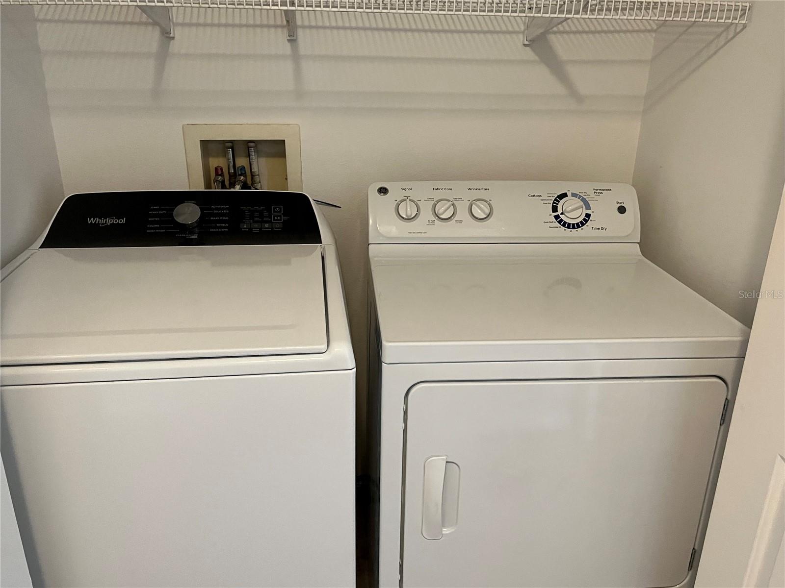 convenient laundry closet with added storage