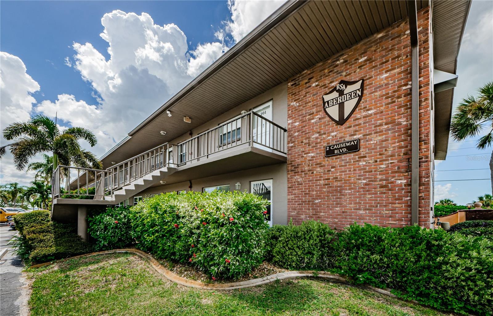 Exterior bldg with parking spot in front