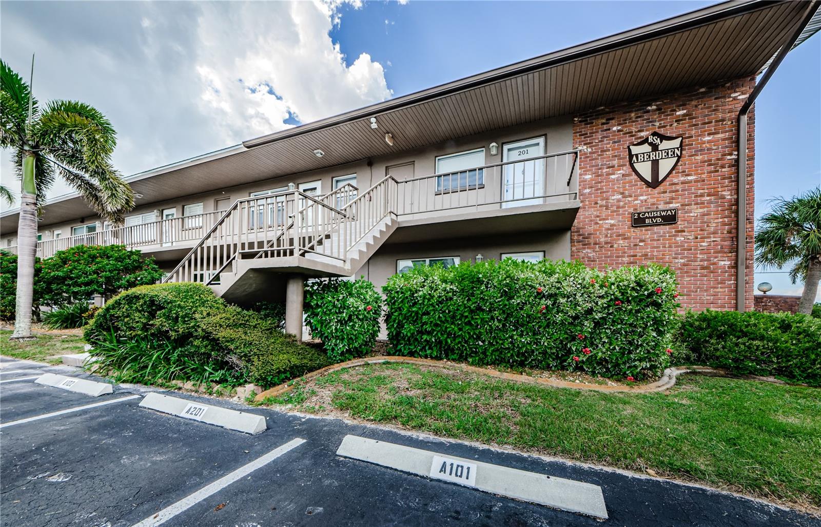 Exterior bldg with parking spot in front