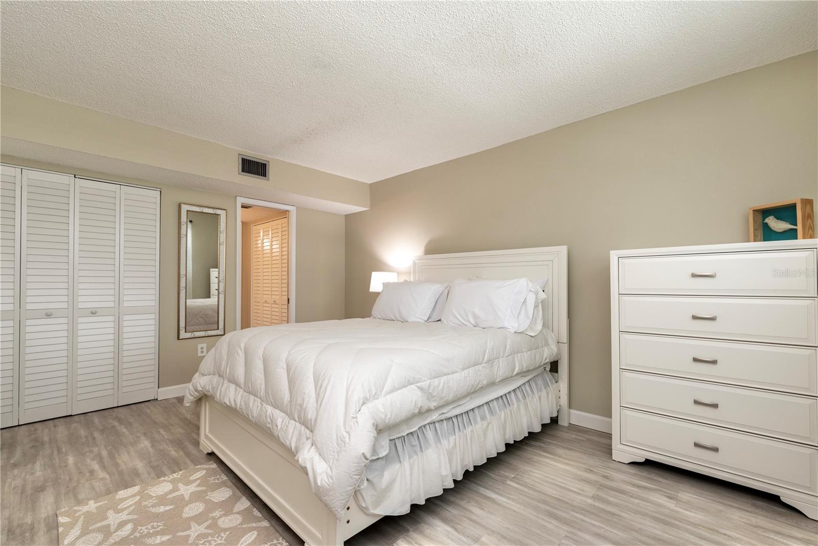 Primary bedroom with ensuite bathroom.