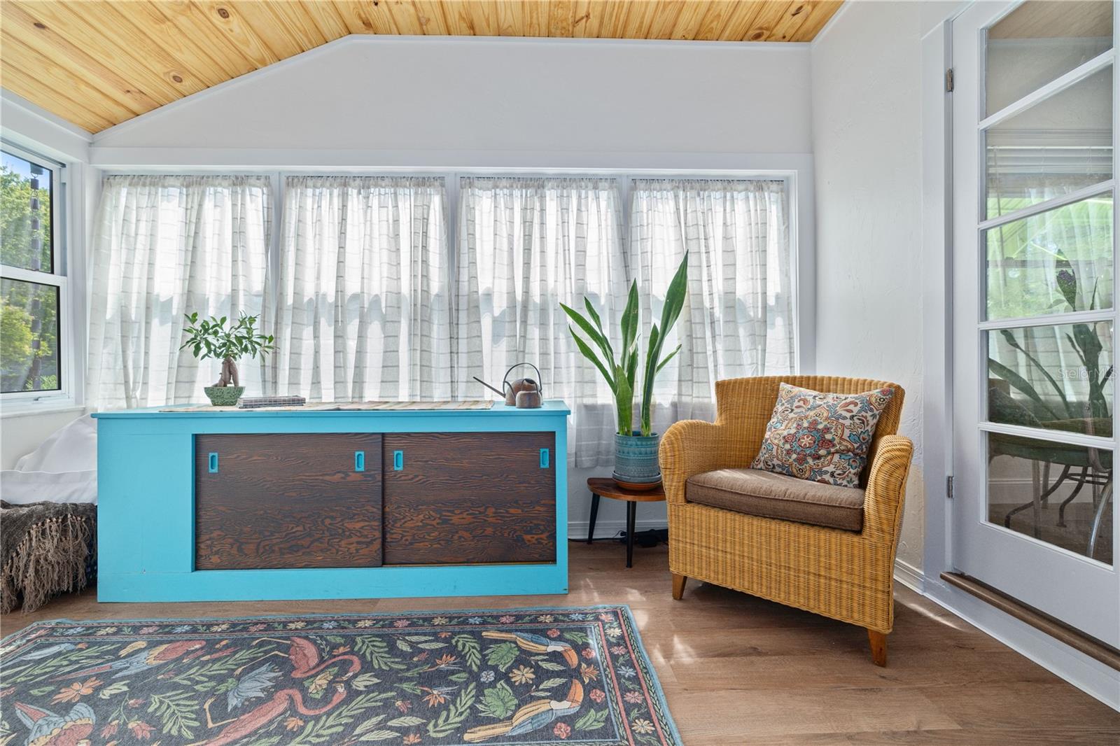 Tongue & Groove wood ceiling, and Luxury Vinyl Flooring.