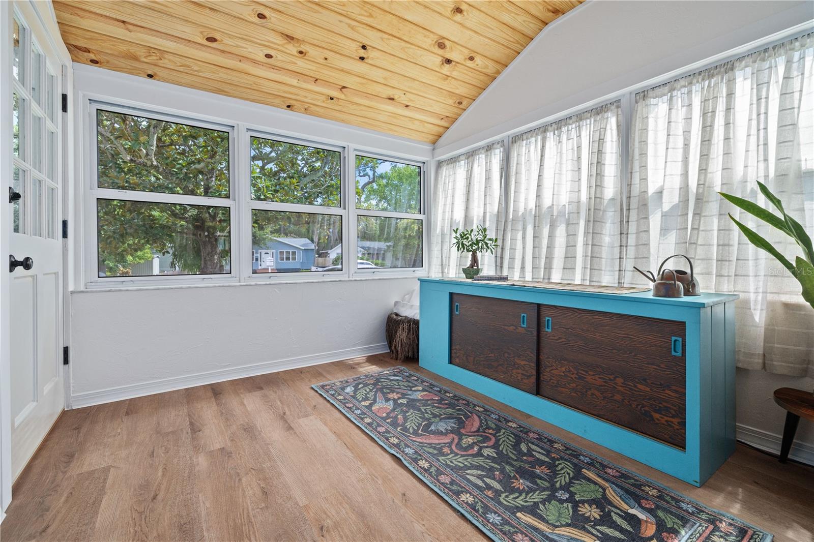 Front entrance into bonus room.  Perfect for office or dining room.