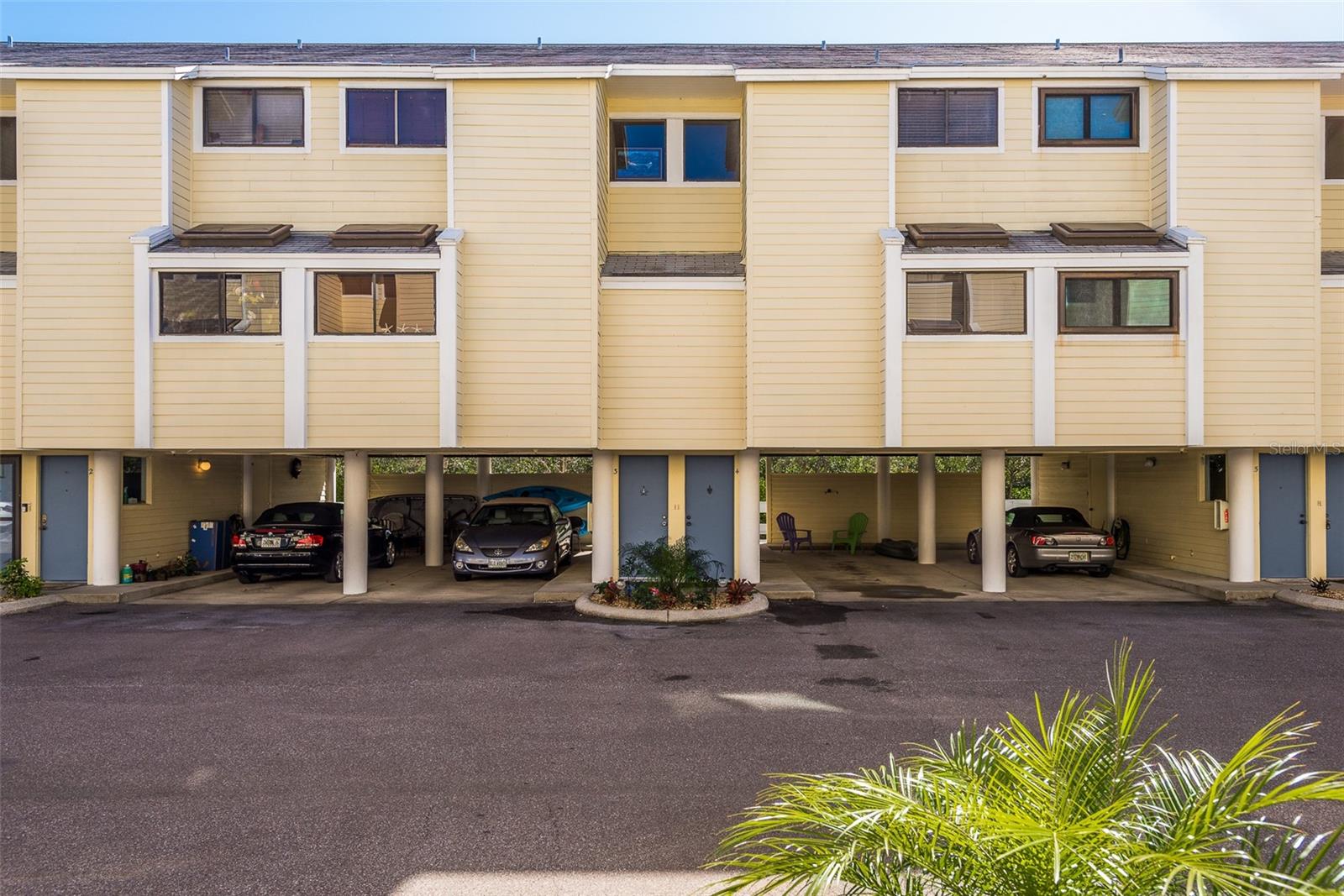 Unit 3- carport can hold kayaks and other sporting equipment