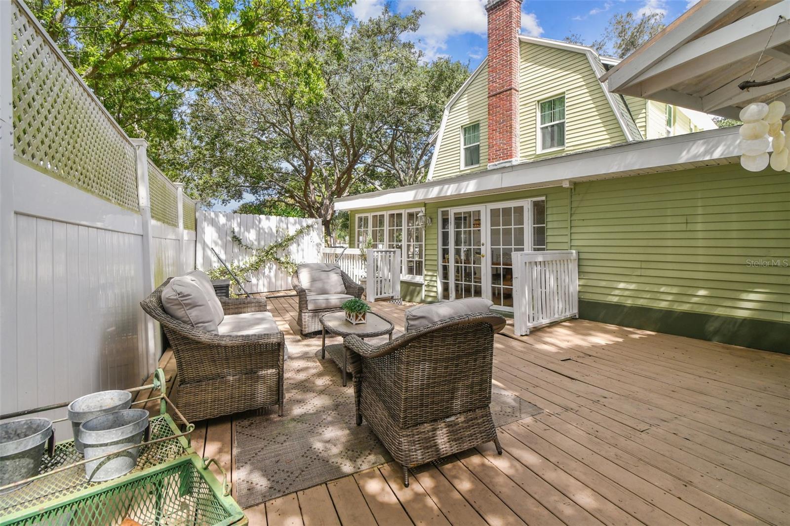 Large wooden deck with dry bar