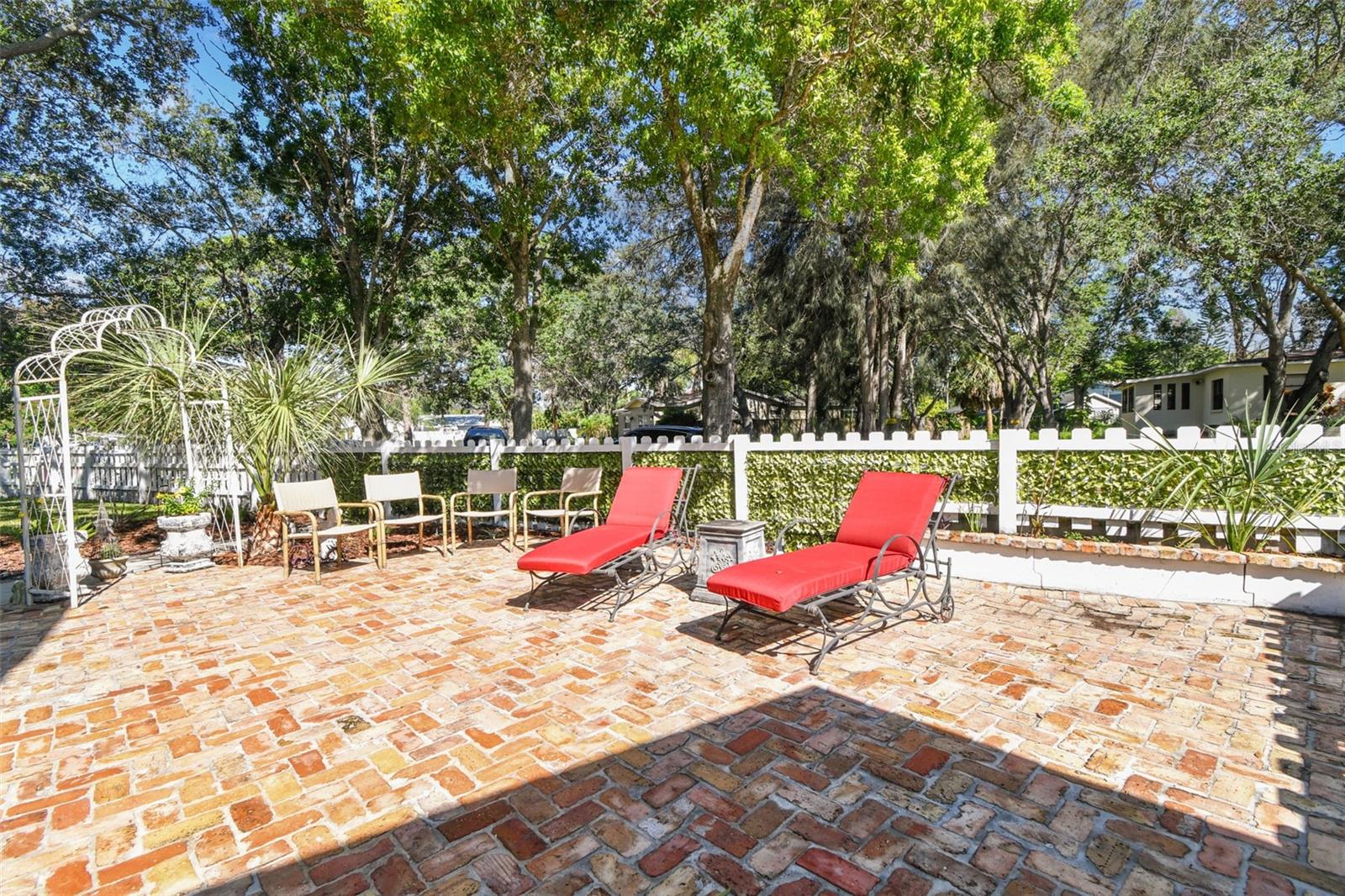 Brick paver patio with access to/from the primary bedroom