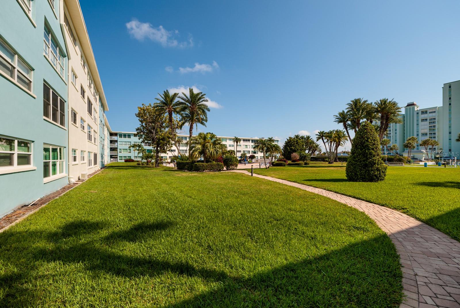 Courtyard in back of unit & heated pool area.