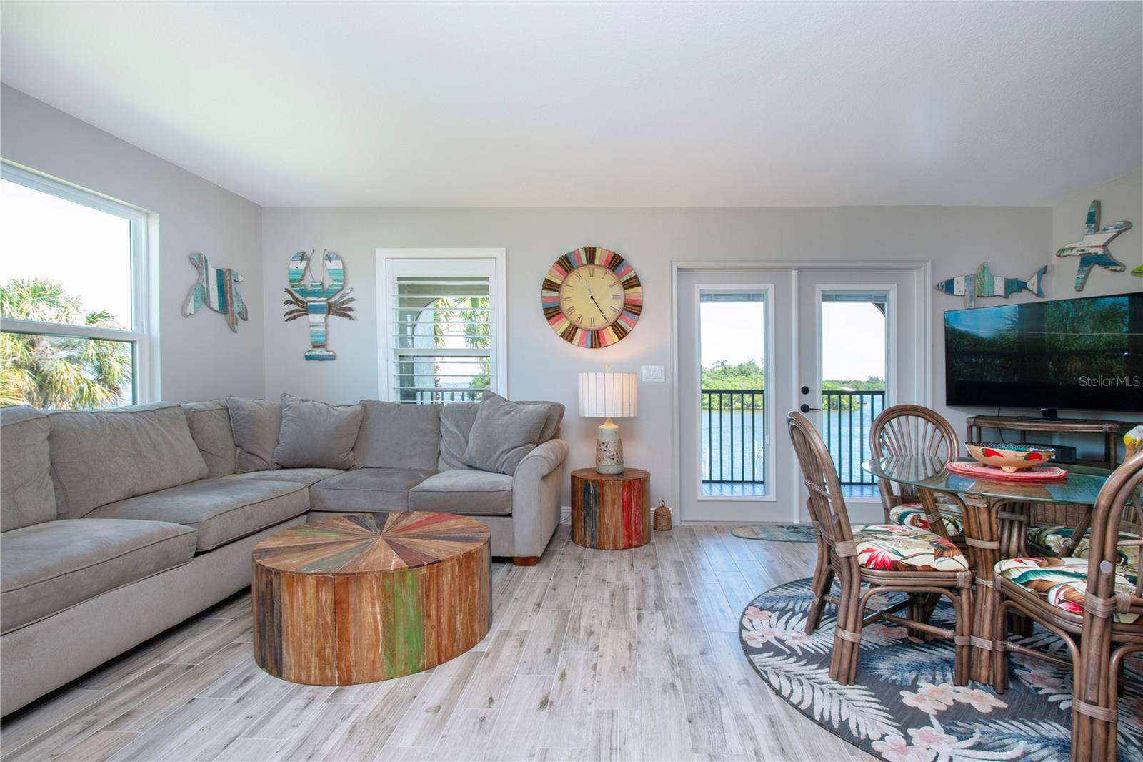 Living and Dining Room With French Doors out to the Balcony