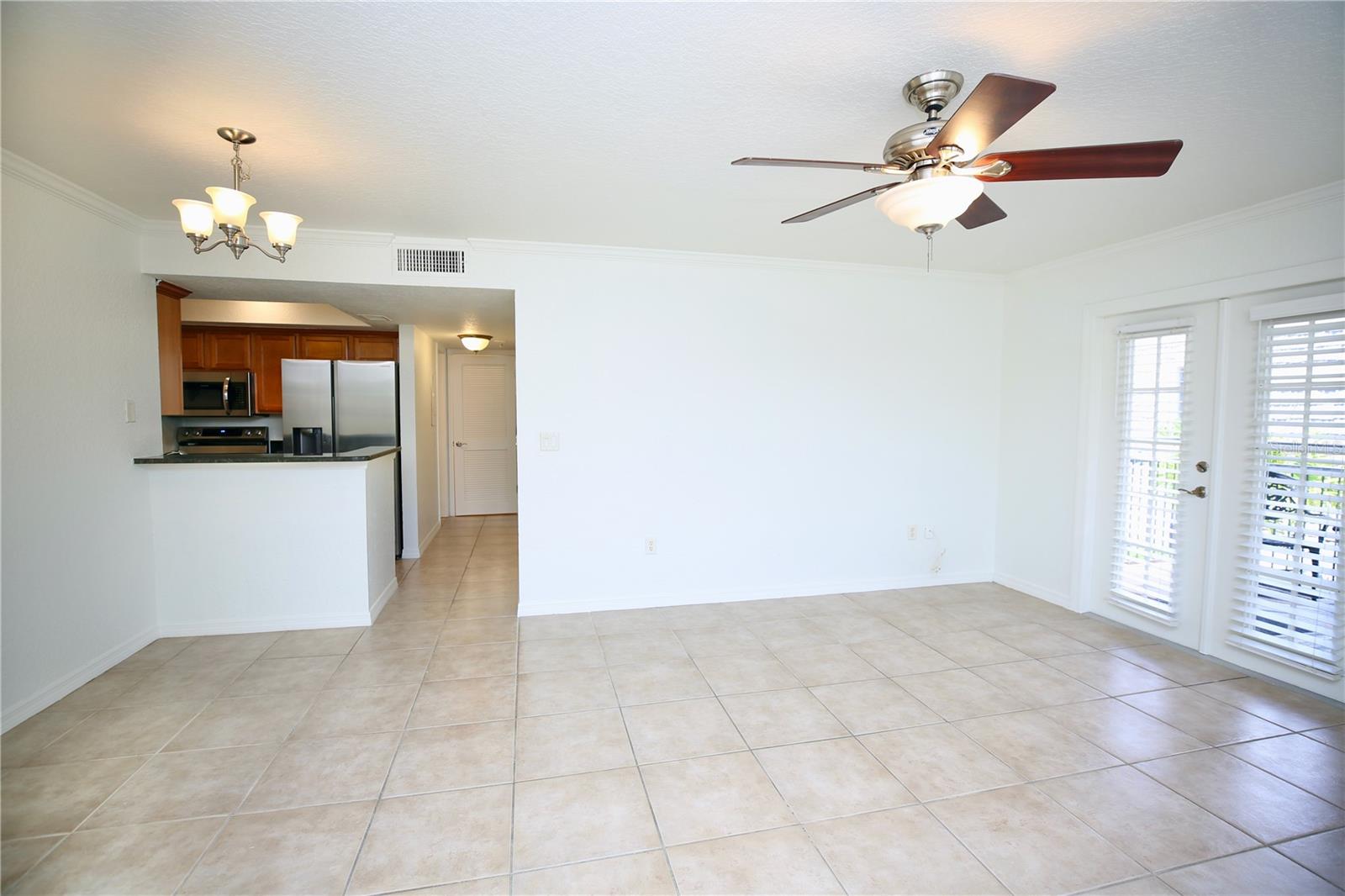 French doors lead to spacious balcony