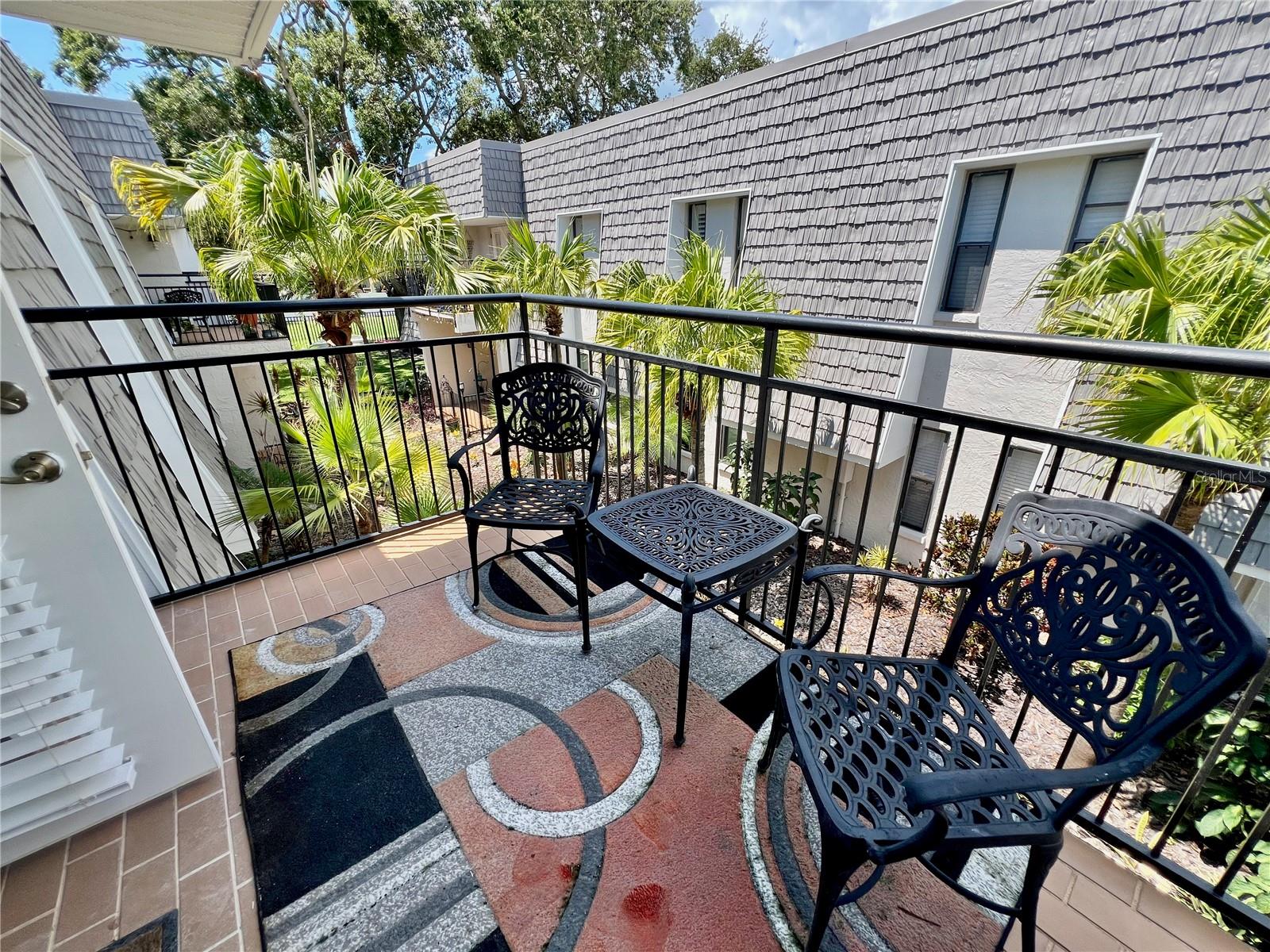 Enjoy your morning coffee from this balcony retreat