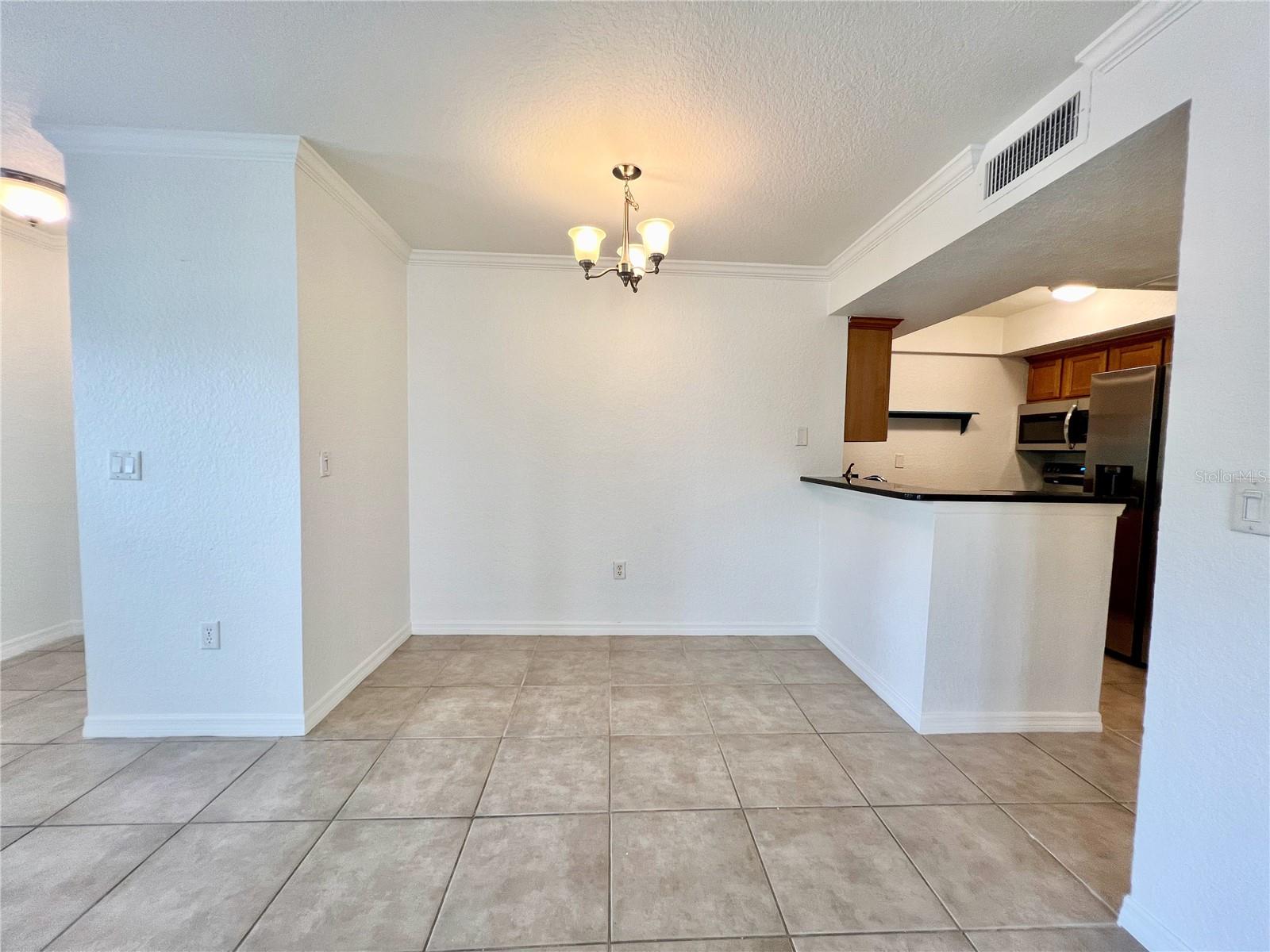 Ceramic tile throughout entire condo