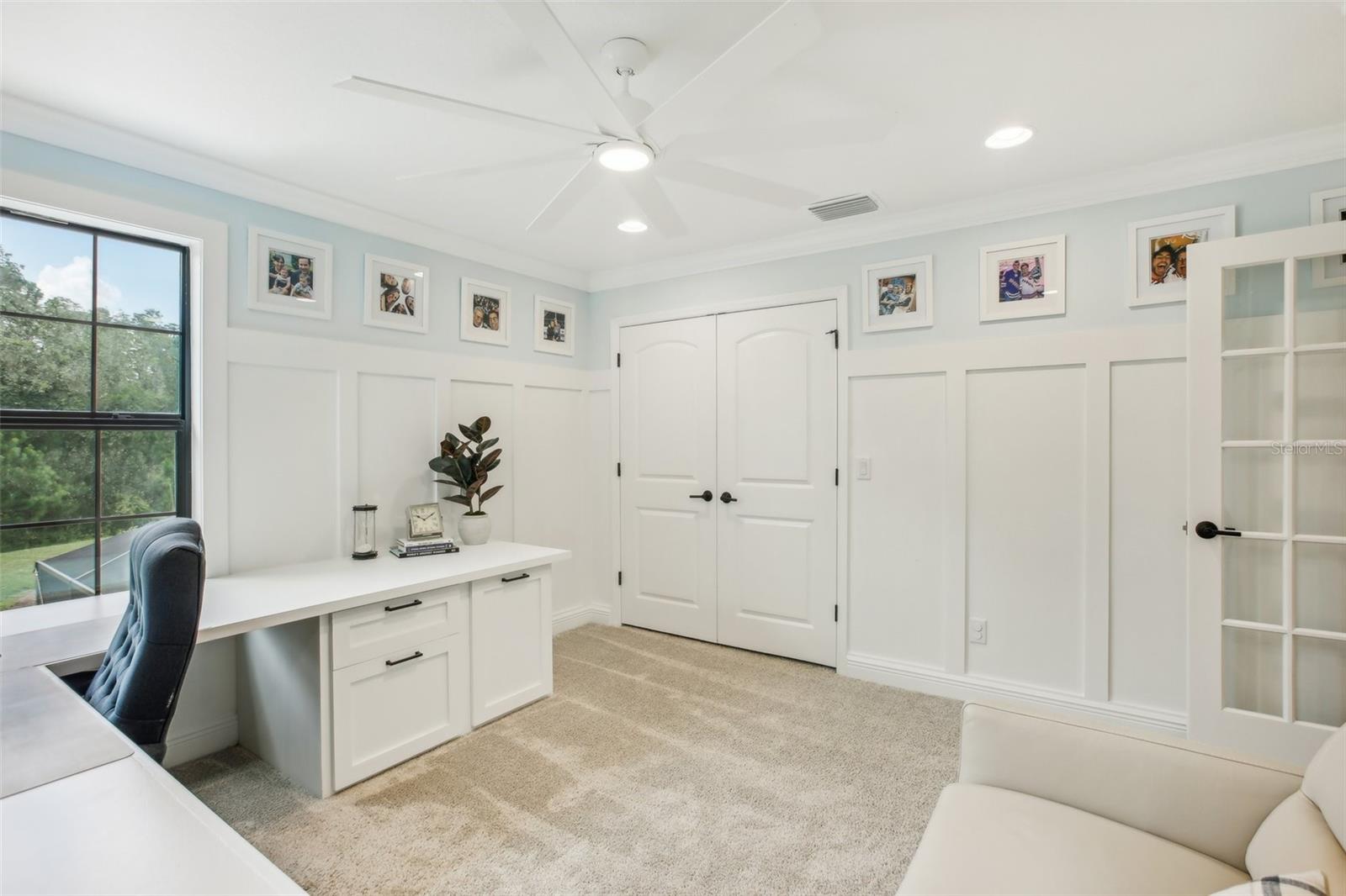 Upstairs bedroom/office with custom built in desk