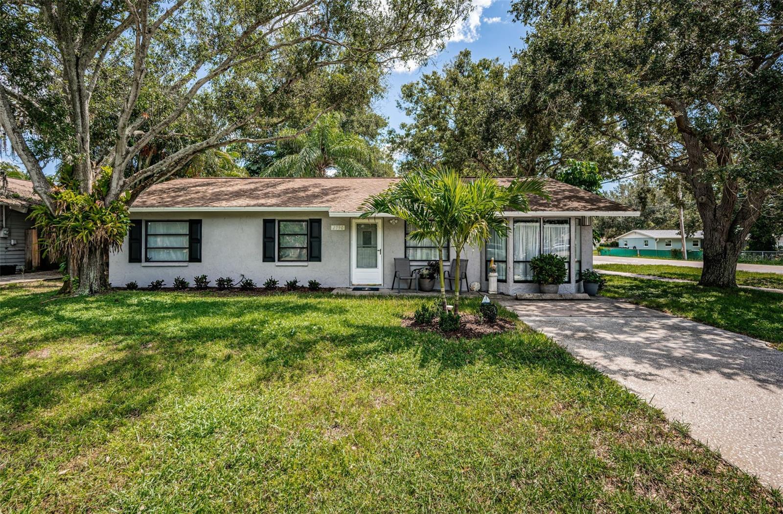 Inviting Curb Appeal with front driveway and oversized Garage with side entry!