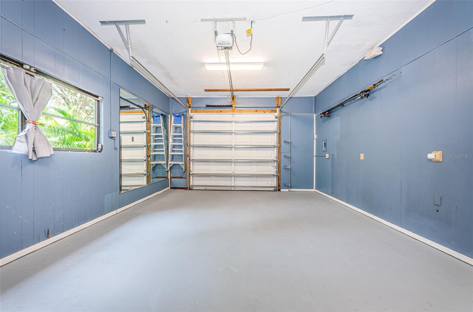 Oversized Garage with Refinished Flooring - the Perfect "Game Room" or "Man Cave"!