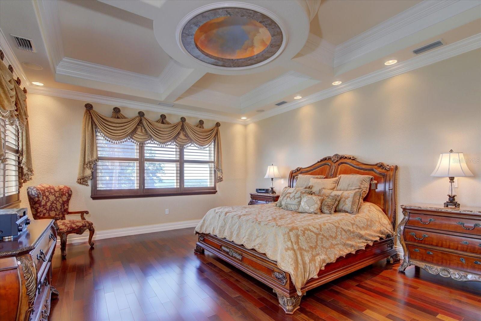 Master Suite with coffered ceilings, faux paint, and cherry plantation shutters