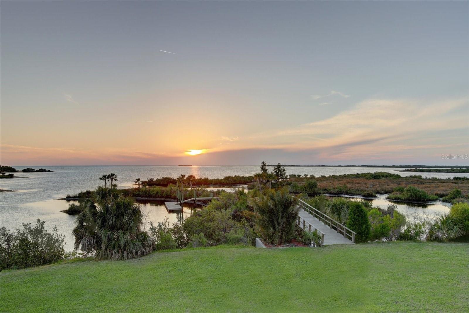 Enjoy the exquisite Gulf Sunsets. Large backyard with plenty of room for a pool.